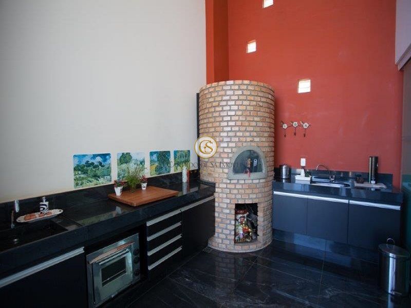 Área gourmet com bancada, armários e forno de pizza - 29951