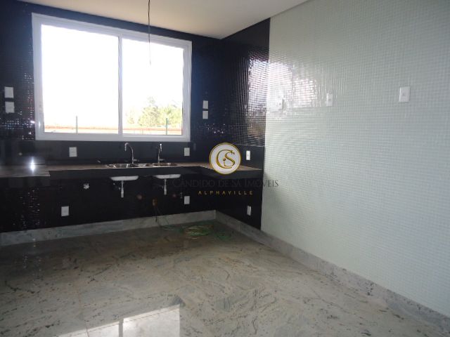 Cozinha com bancada e dois bojos de pia